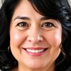 MIGUEL_PÉREZ_A_portrait_of_a_middle-aged_Latin_American_woman_w_467cee74-0748-4938-a761-82234387b4b8